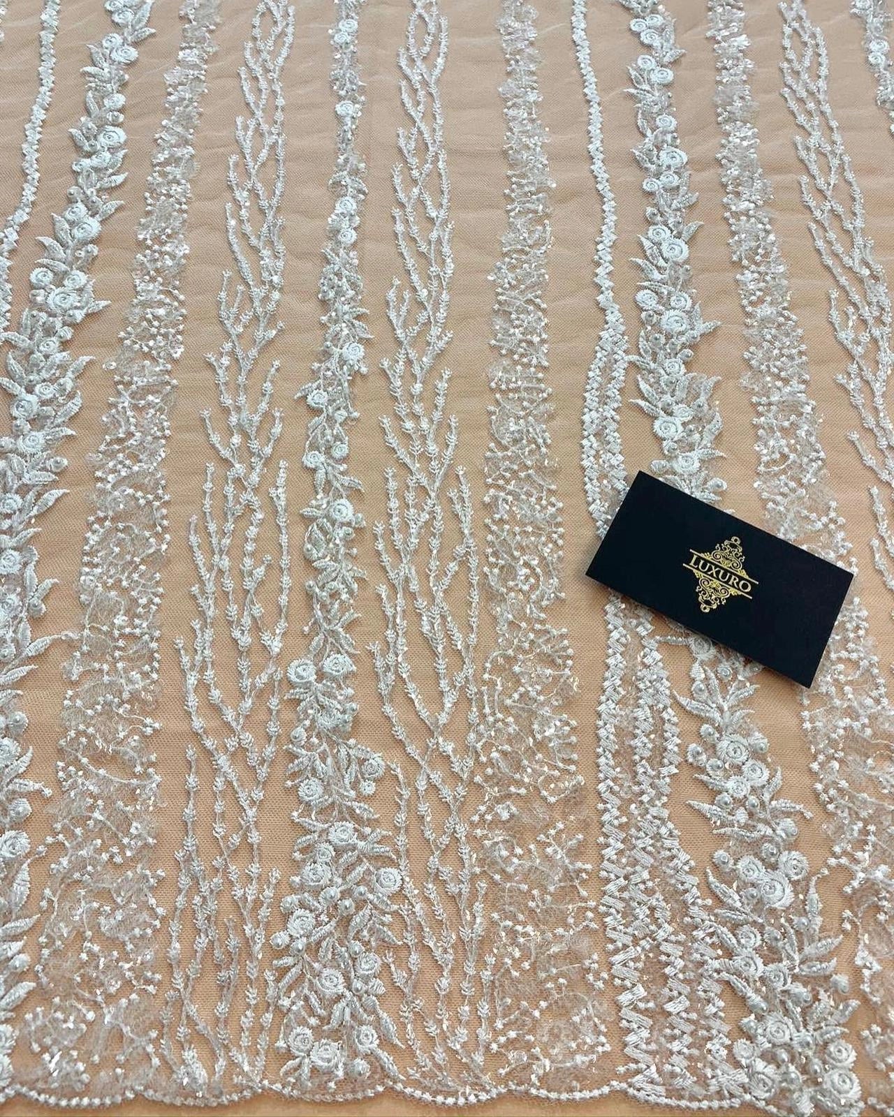 Lace with a Linear Pattern with Flowers, with Sided Pearls and Sequins